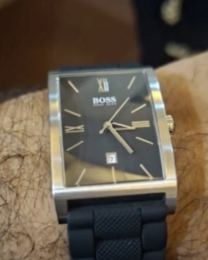 BOSS rectangular watch worn by a customer